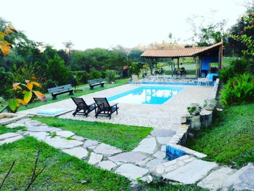 The swimming pool at or close to Pousada Fazenda Bocaina