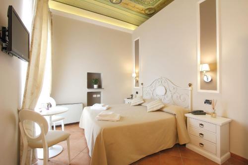 Cama o camas de una habitación en Hotel Ferrucci