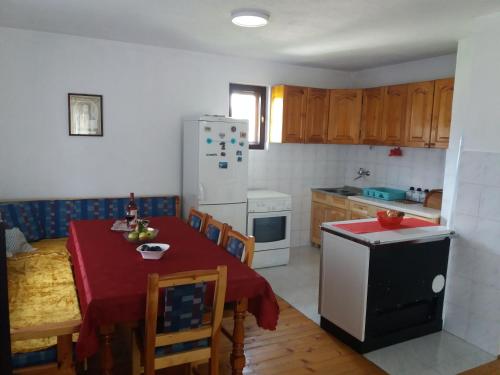 Kuchyň nebo kuchyňský kout v ubytování Apartments And Rooms Gold
