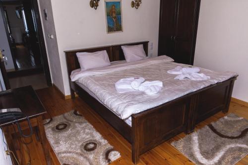 
Ένα ή περισσότερα κρεβάτια σε δωμάτιο στο Μπαλκόνι Ζαγορίου
