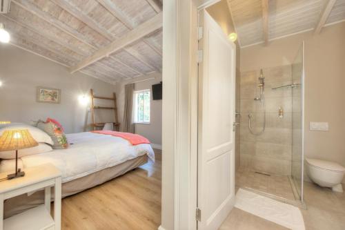 Ένα ή περισσότερα κρεβάτια σε δωμάτιο στο Amberhall Guesthouse