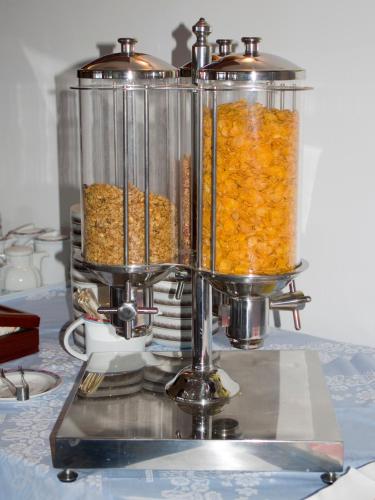 a food processor with food in it on a table at Hotel Cristallo in Lerici