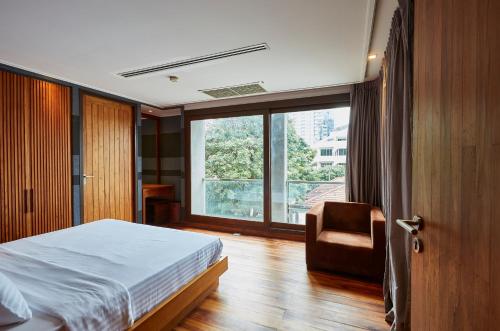 Katil atau katil-katil dalam bilik di LUXX Langsuan Hotel - SHA Plus