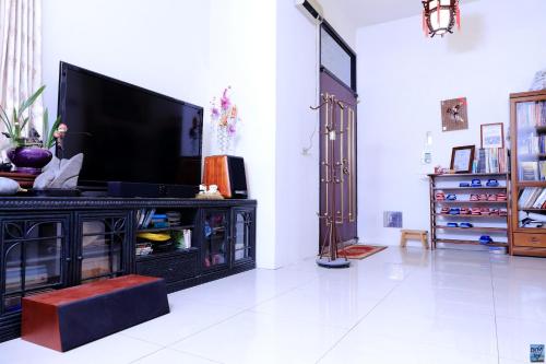 TV a/nebo společenská místnost v ubytování Zuo An Hostel