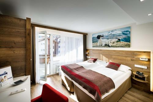 Кровать или кровати в номере Hotel Butterfly