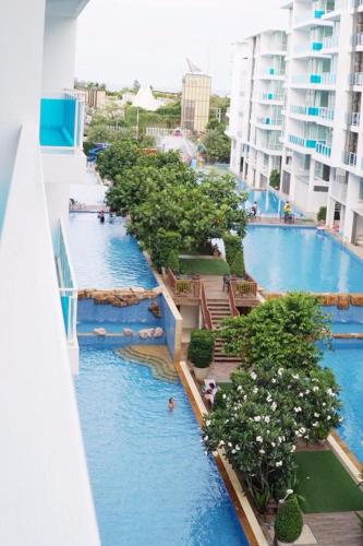 a view of a swimming pool in a resort at My Resort at Hua Hin by Charma in Hua Hin