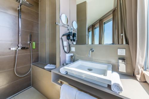 Ein Badezimmer in der Unterkunft aquaTurm Hotel & Energie