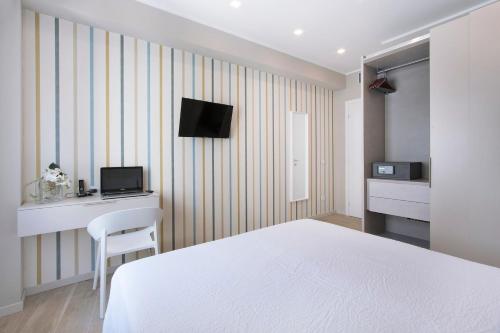 TV a/nebo společenská místnost v ubytování Residence Dolcemare