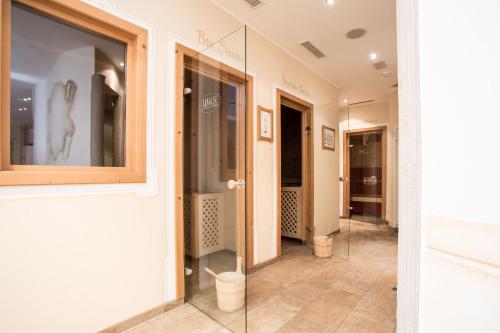 a hallway of a store with glass doors at Der WALZL in Innsbruck