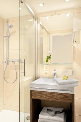 Un baño de Best Western Hotel Favorit