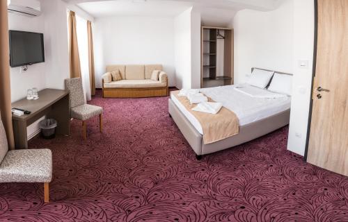 Katil atau katil-katil dalam bilik di Simar Bed & Coffee Guesthouse