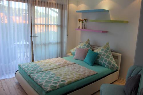 Postel nebo postele na pokoji v ubytování Ferienwohnung Alpenbrise