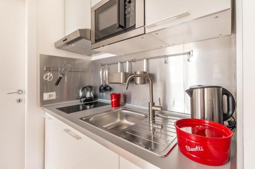 Η κουζίνα ή μικρή κουζίνα στο Alessia's Flat - Affori