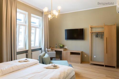 Cama ou camas em um quarto em Cottage Rheingau Hotel
