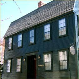 a large blue house with a red door at Clarkeston Inn in Newport