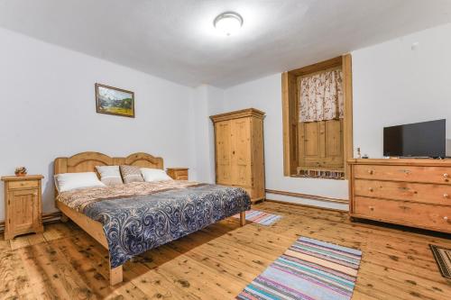 Ένα ή περισσότερα κρεβάτια σε δωμάτιο στο Casa Trappold