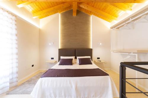 Postel nebo postele na pokoji v ubytování Suite Cavour - SunTripSicily