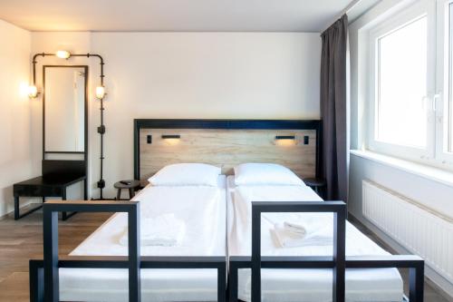 Letto o letti in una camera di a&o Berlin Mitte