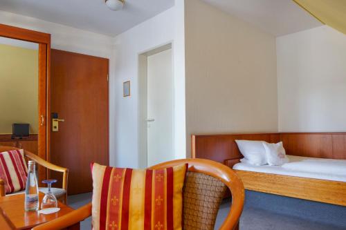 Katil atau katil-katil dalam bilik di Hotel Schwärs Löwen Freiburg