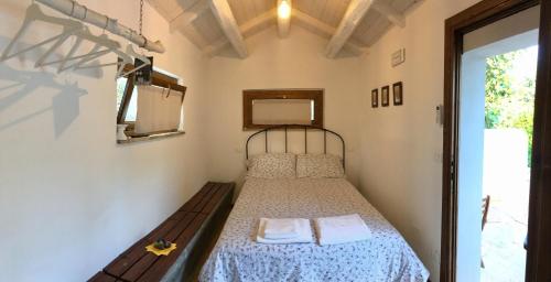 En eller flere senger på et rom på C'era una volta Podere San Giovanni