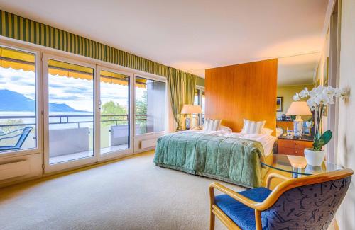Postel nebo postele na pokoji v ubytování Royal Plaza Montreux