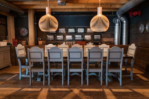 a dining room with a table and chairs at Radisson Blu Hotel Tromsø in Tromsø