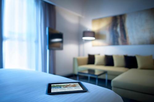  Centro Capital Centre By Rotana -  Room  picture :   Shower    Safety deposit box    TV                           