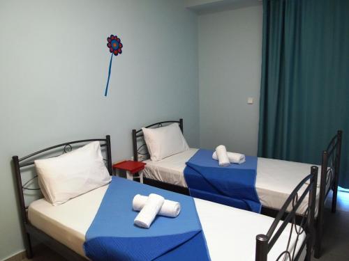 Ένα ή περισσότερα κρεβάτια σε δωμάτιο στο Welcommon Hostel