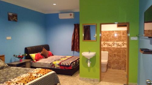 Giường trong phòng chung tại Mazza Nur Motel