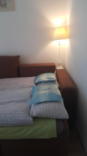 
Łóżko lub łóżka w pokoju w obiekcie Apartament Rajska Centrum
