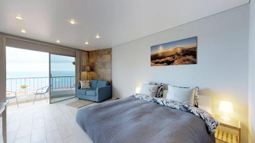 Posteľ alebo postele v izbe v ubytovaní Cosy 0cean Vew Studio