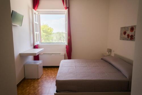 Postel nebo postele na pokoji v ubytování Paradise beb