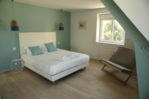 Postel nebo postele na pokoji v ubytování Roscoff Beach House