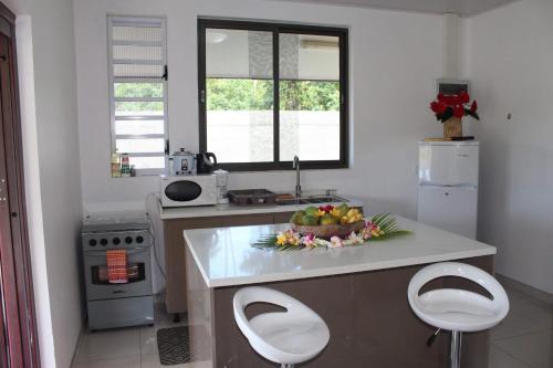 Kuchyň nebo kuchyňský kout v ubytování Bora-Bora House