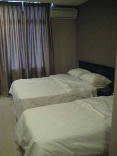 Кровать или кровати в номере Festival Boutique Hotel