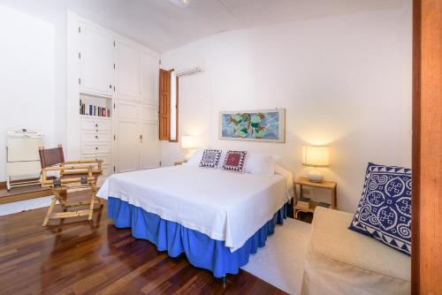 Łóżko lub łóżka w pokoju w obiekcie Villa Il Melograno