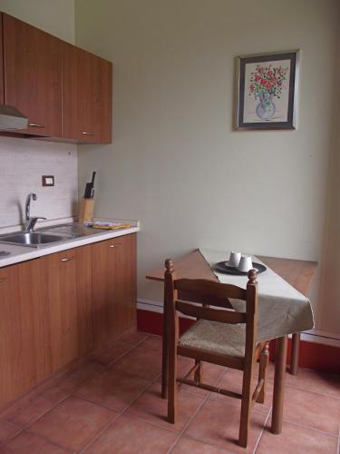 Kuchyň nebo kuchyňský kout v ubytování Hotel Ciocca