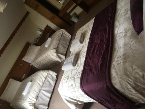 Cama o camas de una habitación en Portarra Lodge Guesthouse