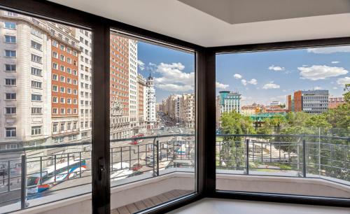 a view of a city from a window at Barceló Torre de Madrid in Madrid