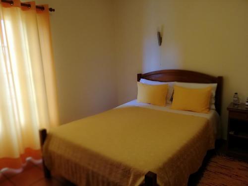 Postel nebo postele na pokoji v ubytování Residencial Idalio