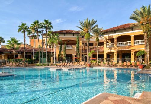 a large swimming pool in front of a resort at Floridays Orlando Two & Three Bed Rooms Condo Resort in Orlando