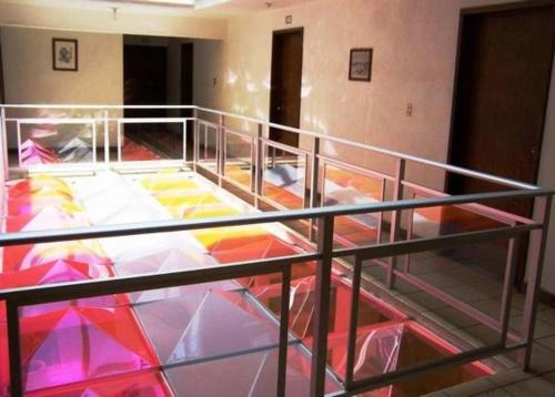 Postel nebo postele na pokoji v ubytování Hotel Don Pedro Centro