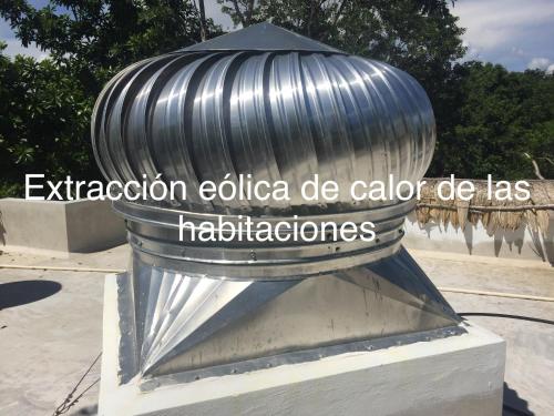 a metal object with the words educationelloello do calderon be calder at Estancia Lapislázuli in Bacalar