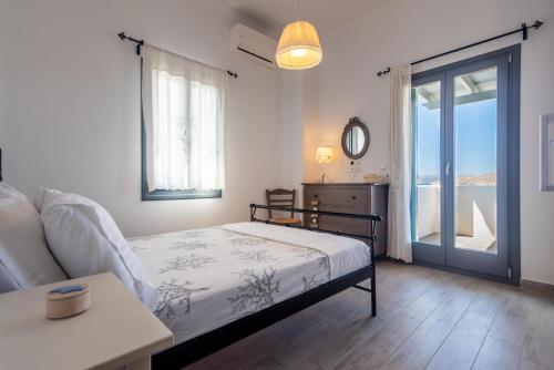 Postel nebo postele na pokoji v ubytování Milian Suite