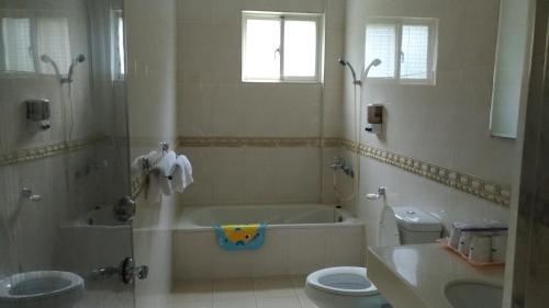 Bilik mandi di Zuo An Hostel