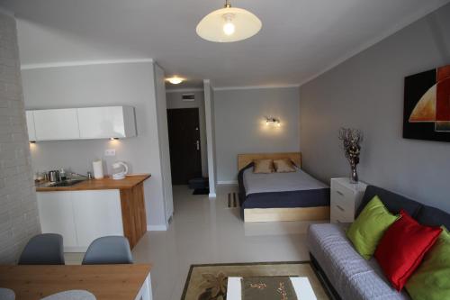 Posteľ alebo postele v izbe v ubytovaní Apartament pod Jasną Górą