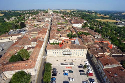 an aerial view of a town with a building at Gite des remparts à Lectoure in Lectoure