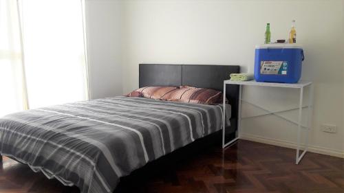 Abbotsford Private Rooms & Pods - 15 Charles Homestayにあるベッド