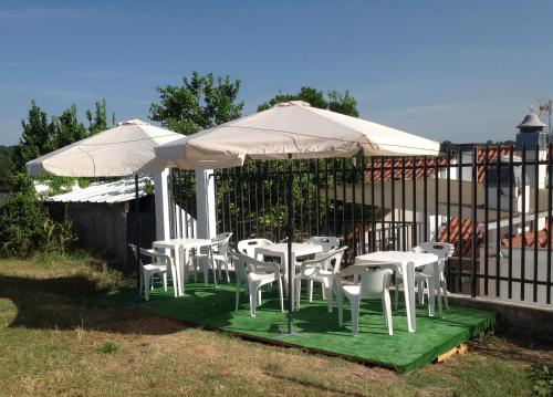 Κήπος έξω από το Guesthouse Muralhas do Mino