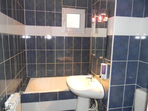 Koupelna v ubytování Apartament Silva Busteni